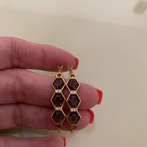 NWOT Henri Bendel gold hoops with smoky gems.